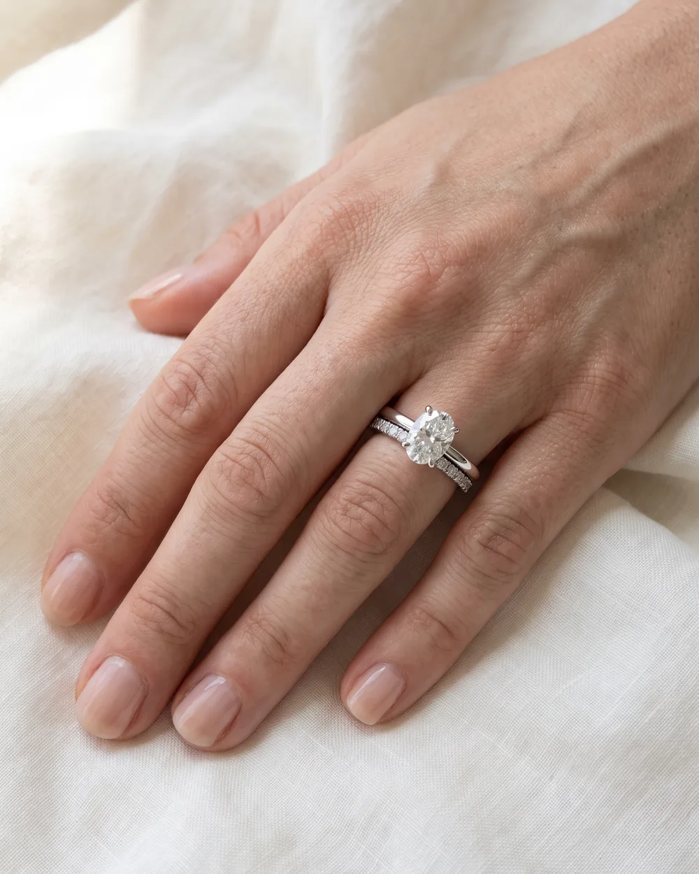 The Oval Pair on a hand, 2 ct, white lab-grown diamond