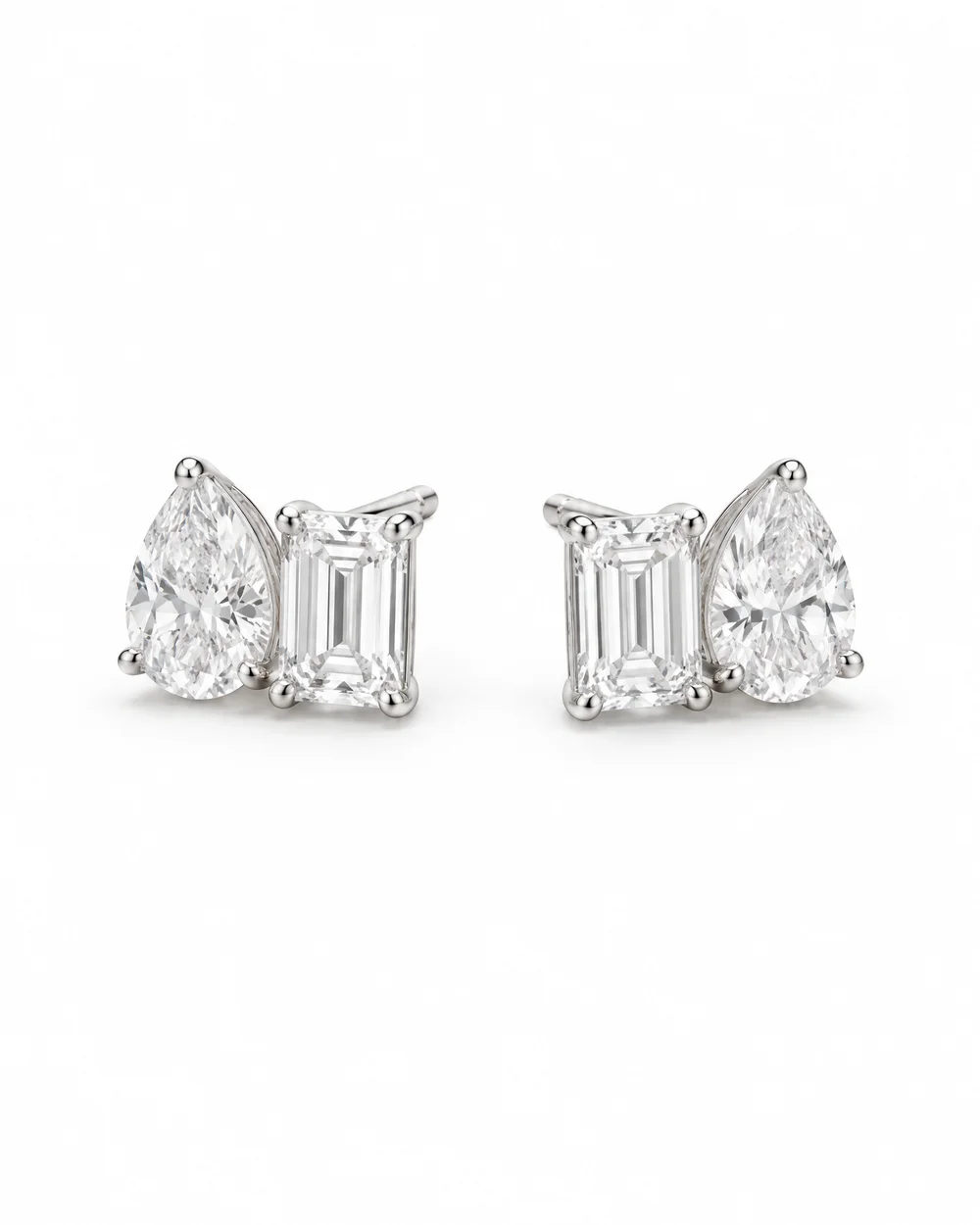 Toi et Moi Studs, pear and emerald, on white
